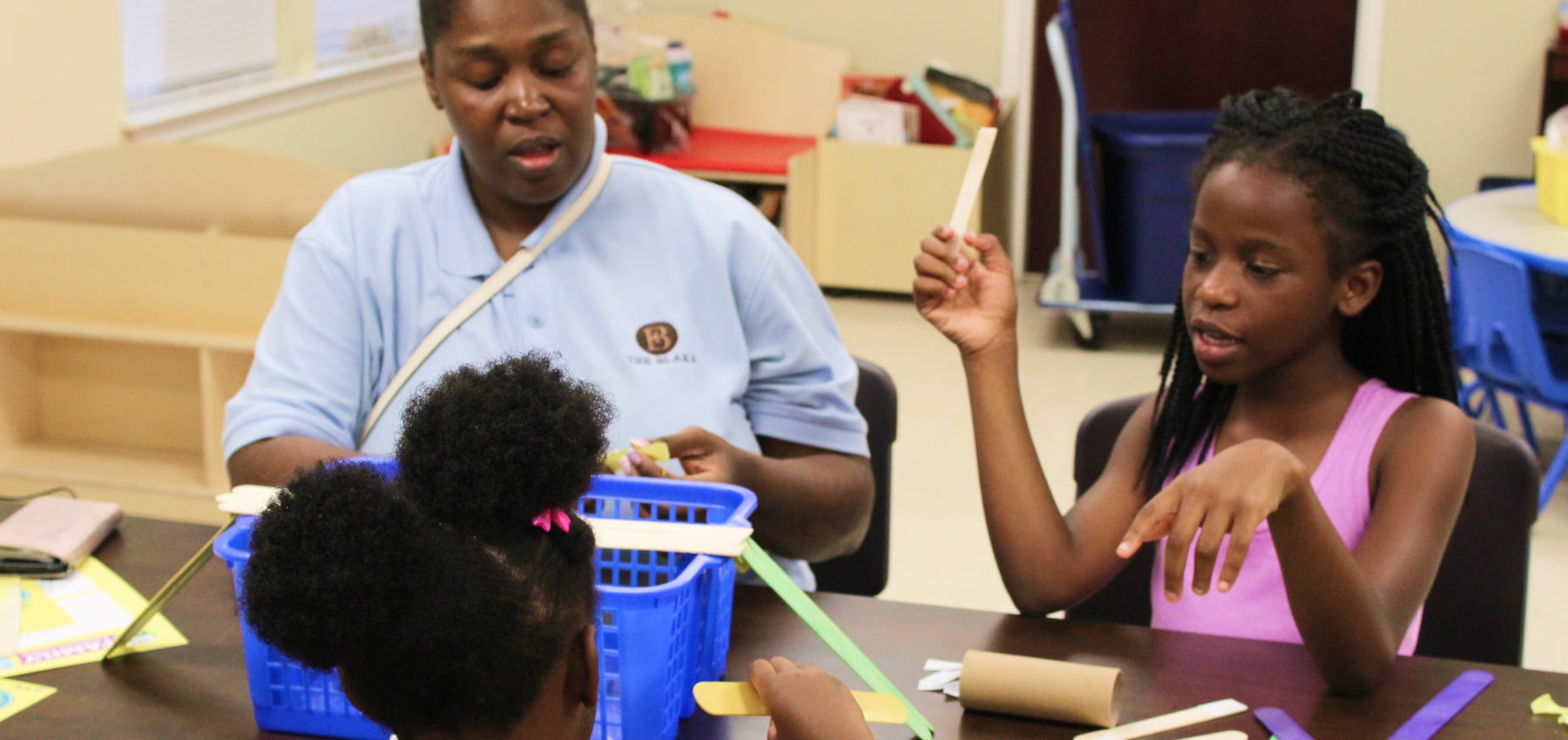 Teacher and children in a classroom